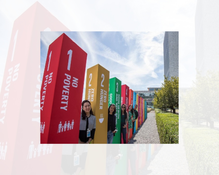 Blocos coloridos enfileirados, com uma pessoa encostada em cada um deles, trazendo os dizeres em inglês no hunger, no poverty, good health